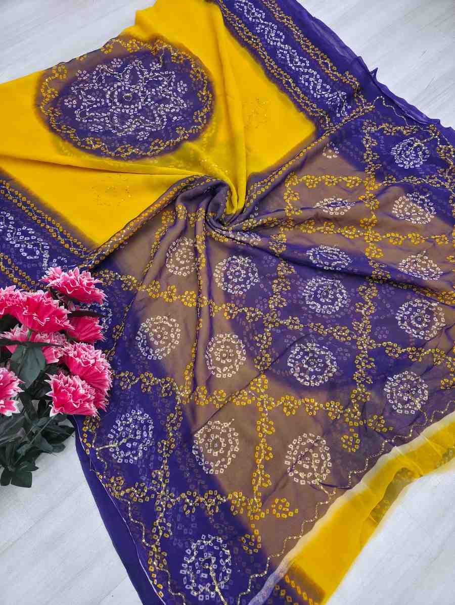 Yellow saree with purple bandhej designe
