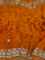 Rust orange pure chiffon pittan work saree
