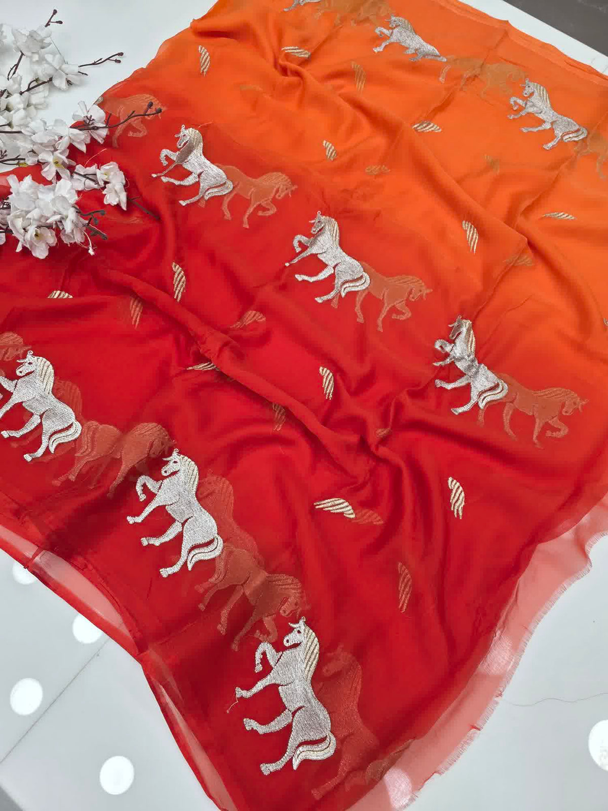 Rust orange horse designe saree